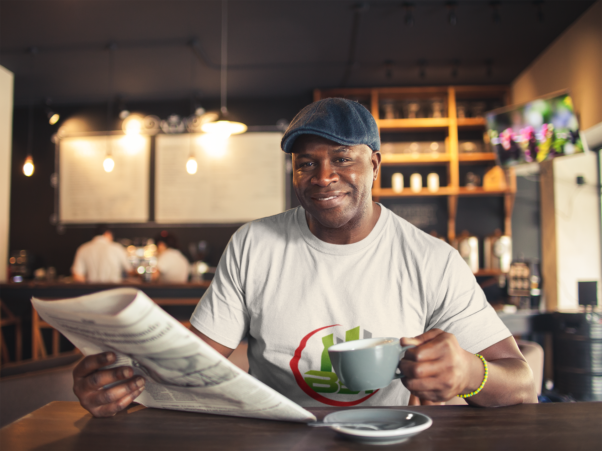 t-shirt-mockup-of-a-man-having-a-coffee-while-reading-the-newspaper-bet